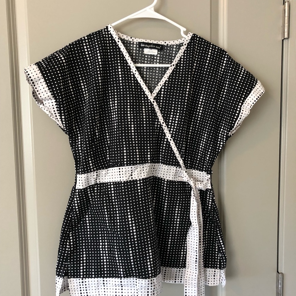 Two Small women’s scrub tops
